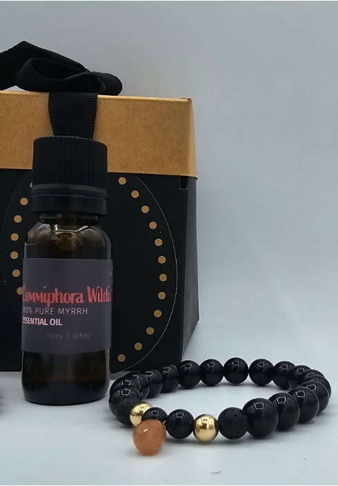 0.25" Ruby Essential Oil Bracelet Kit, Front shot of kit with 15ml Namibian Myrrh essential oil and ruby bracelet