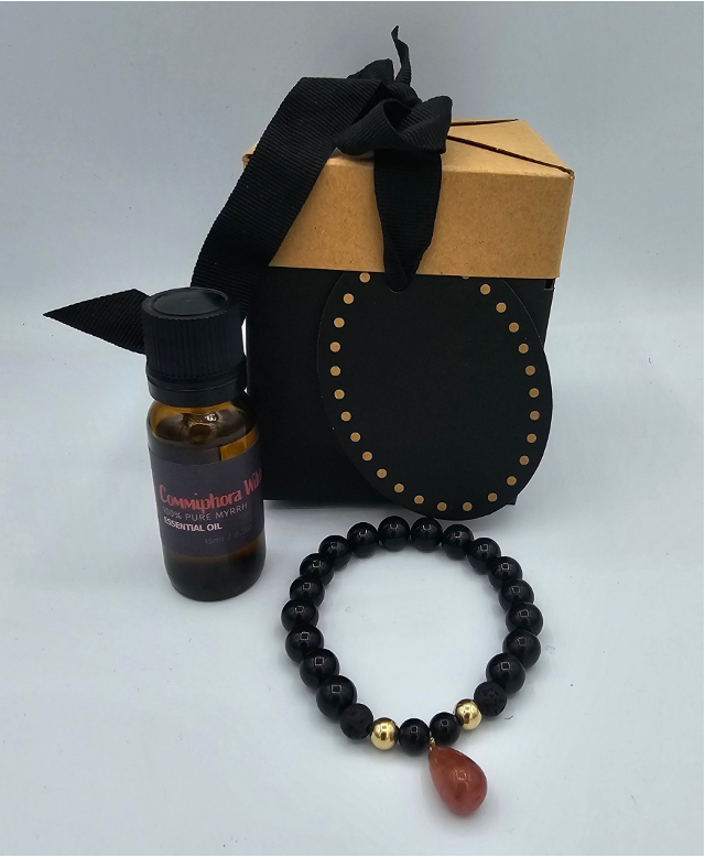 0.33" Ruby Essential Oil Bracelet Kit, Front shot of kit with 15ml Namibian Myrrh essential oil and ruby bracelet
